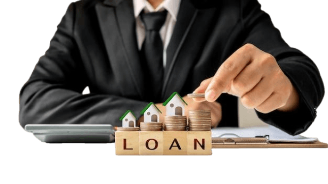 Person stacking coins with house models